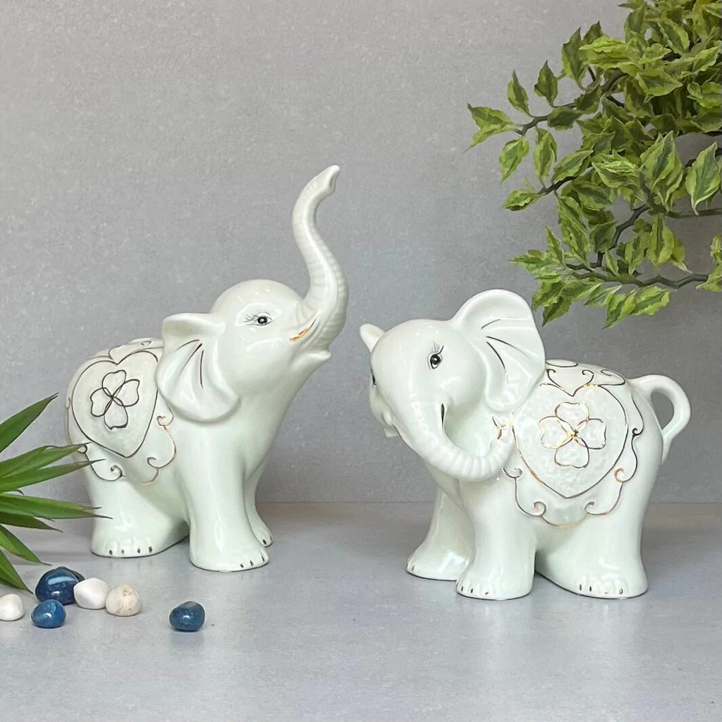 Porcelain Elephant pair Buy a pair of porcelain elephants … Flickr