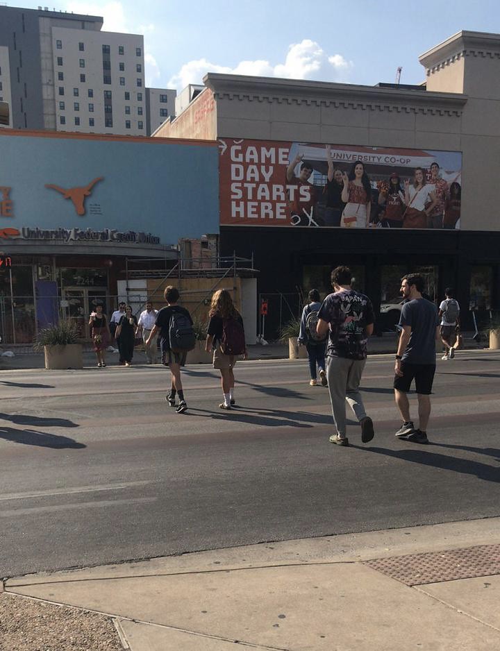 Pedestrians on the UT Austin campus. Guadalupe street. Flickr