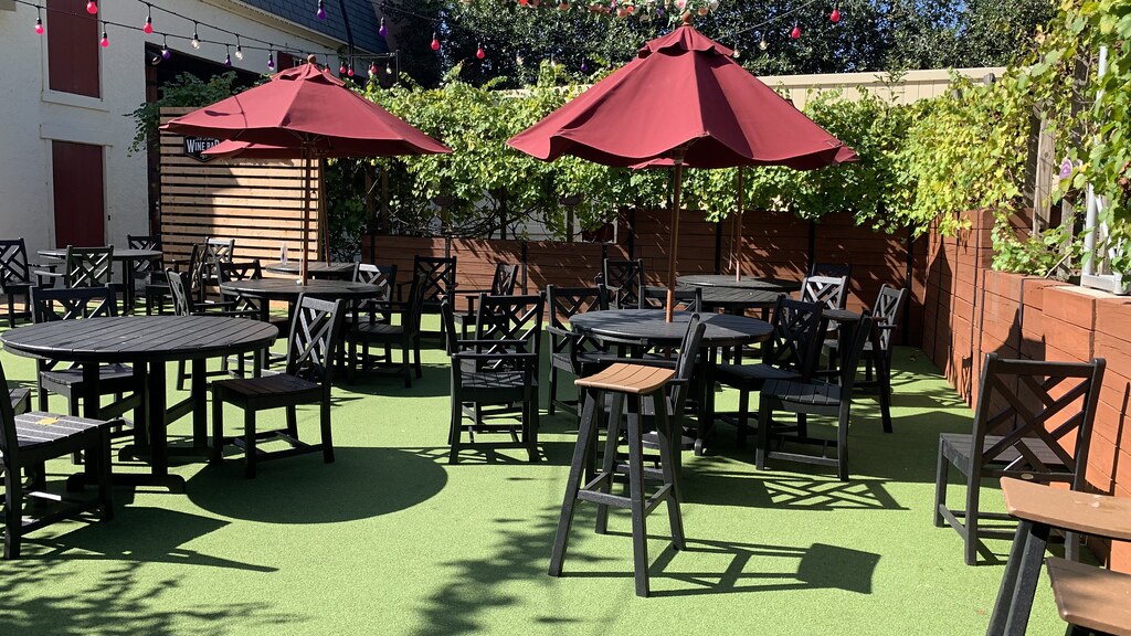 La Belle Wine Bar seating area/grape arbors La Belle Wine … Flickr