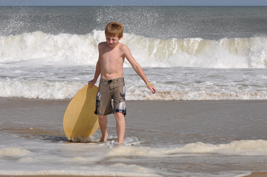 Child in the surf Rehoboth Beach, Delaware Mary Ann Daly Flickr