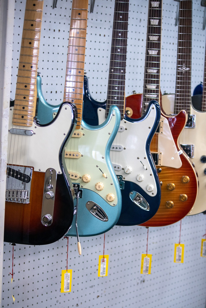 McBride Music and Pawn Shop to Close Electric guitars hang… Flickr