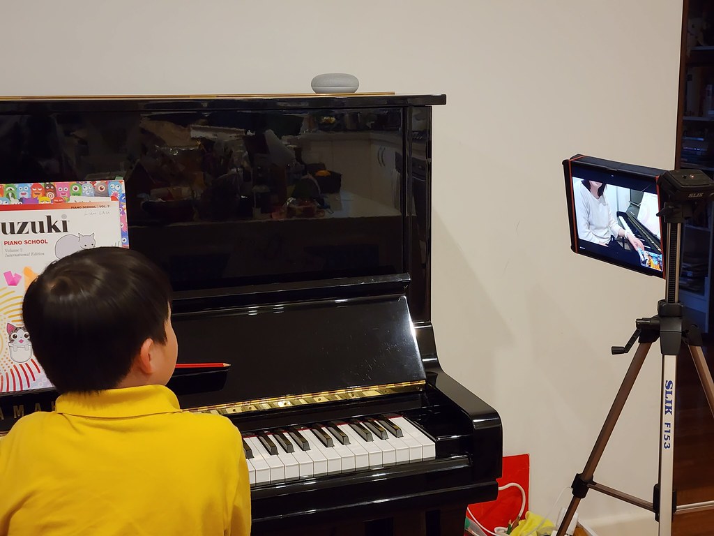 Liam doing piano lesson online, piano teacher not feeling … Flickr