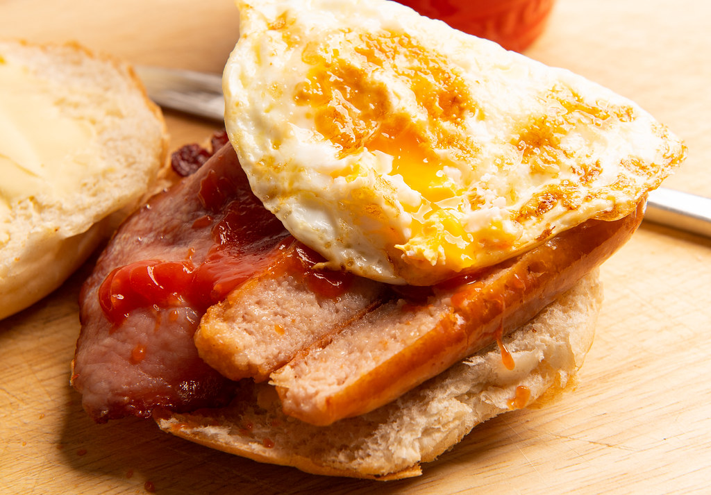 _DSC87913 A homemade bacon, sausage & egg butty. Bob Peters Flickr