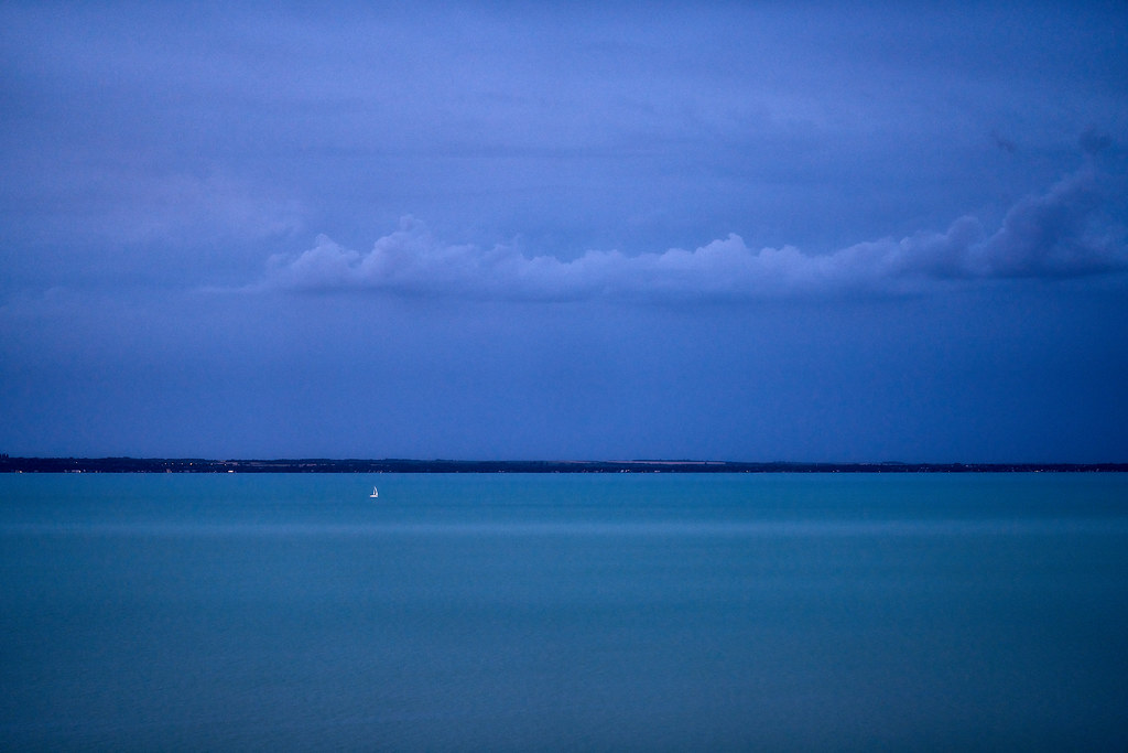 A lone sailboat on lake Balaton in stormy weather Out ther… Flickr