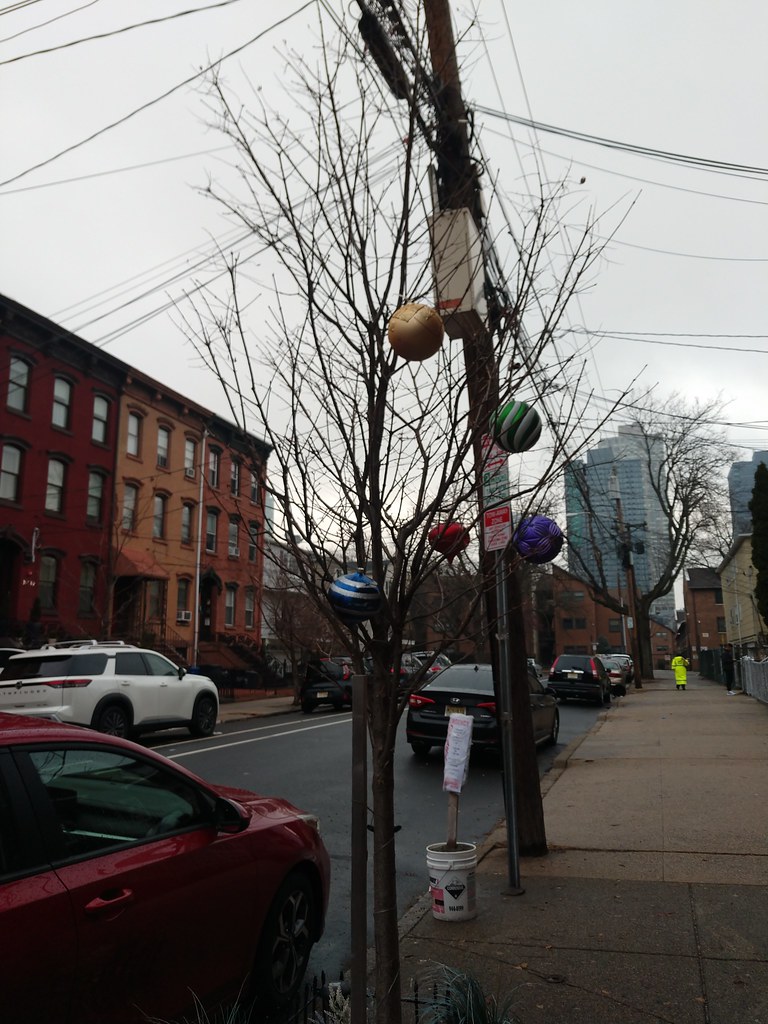 huge christmas tree bulbs on sidewalk tree Jersey City, Ne… Flickr