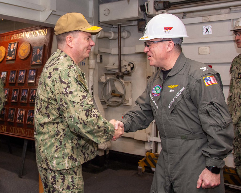 Vice Adm. Rick Cheeseman greets Capt. Daryle Cordone on th… Flickr