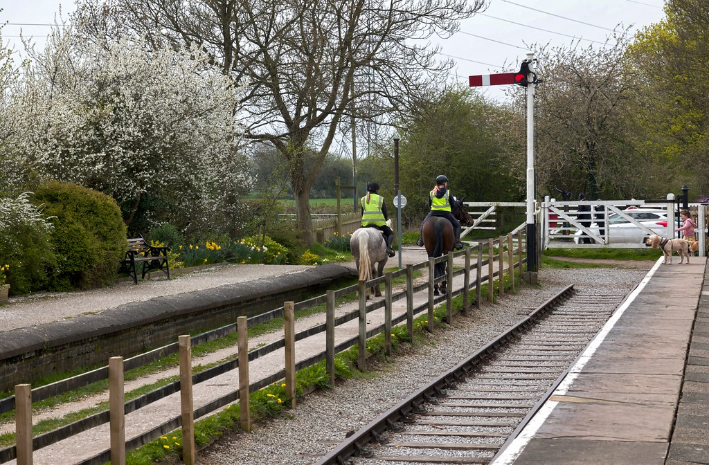 Stop Two horse riders enjoying their ride along The Wirral… Flickr