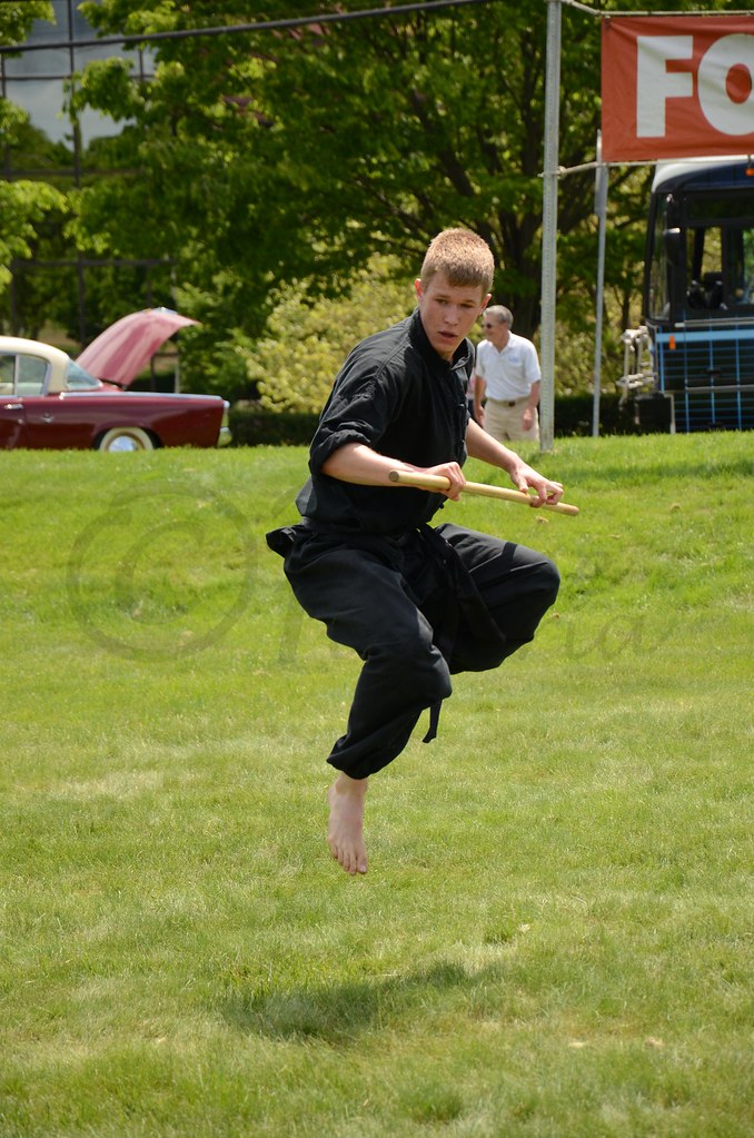 Bo Staff Demonstration A young man demonstrates a kata sol… Flickr