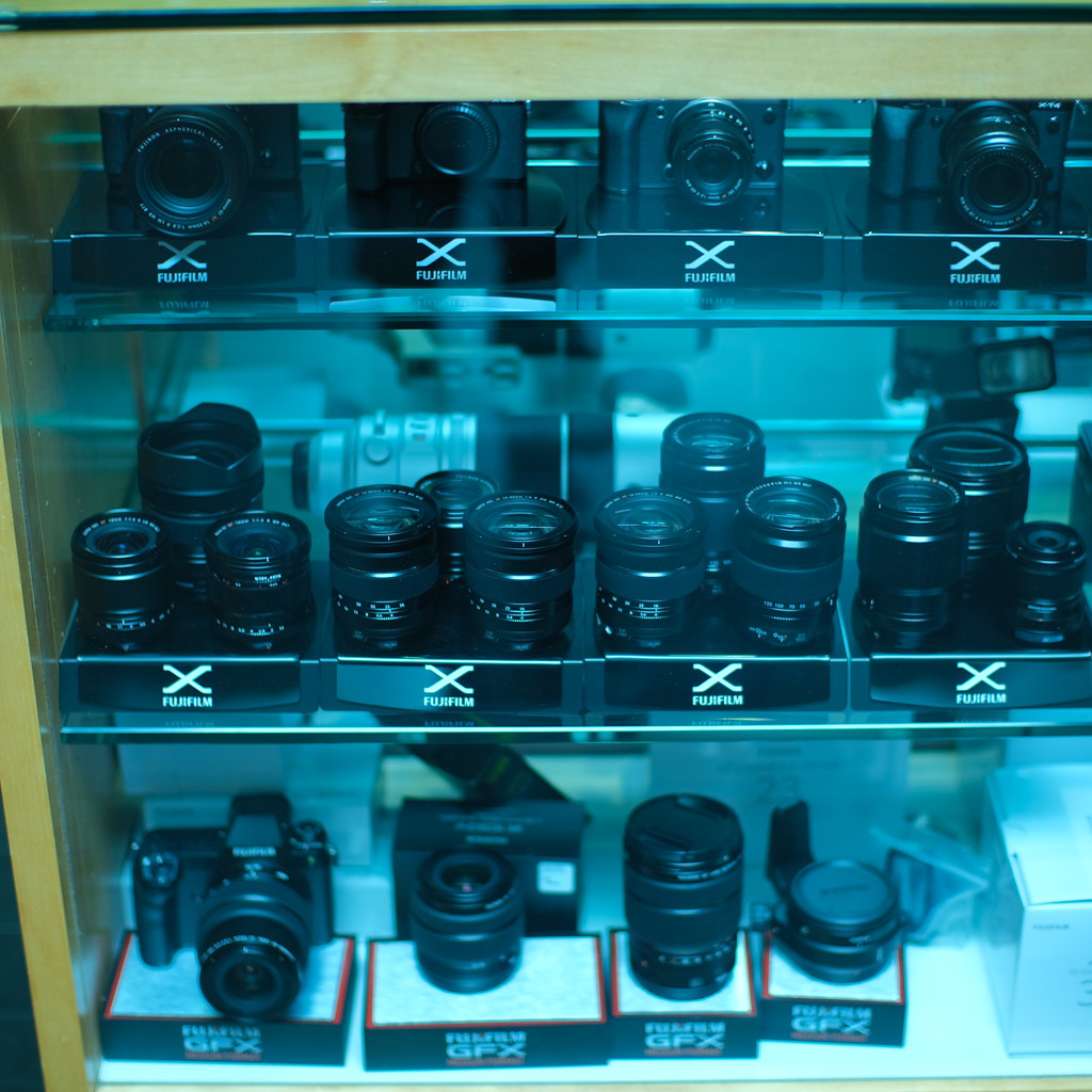 Fujifilm Shelf I really want that GFX 50s II on the bottom… Dru Kelly Flickr
