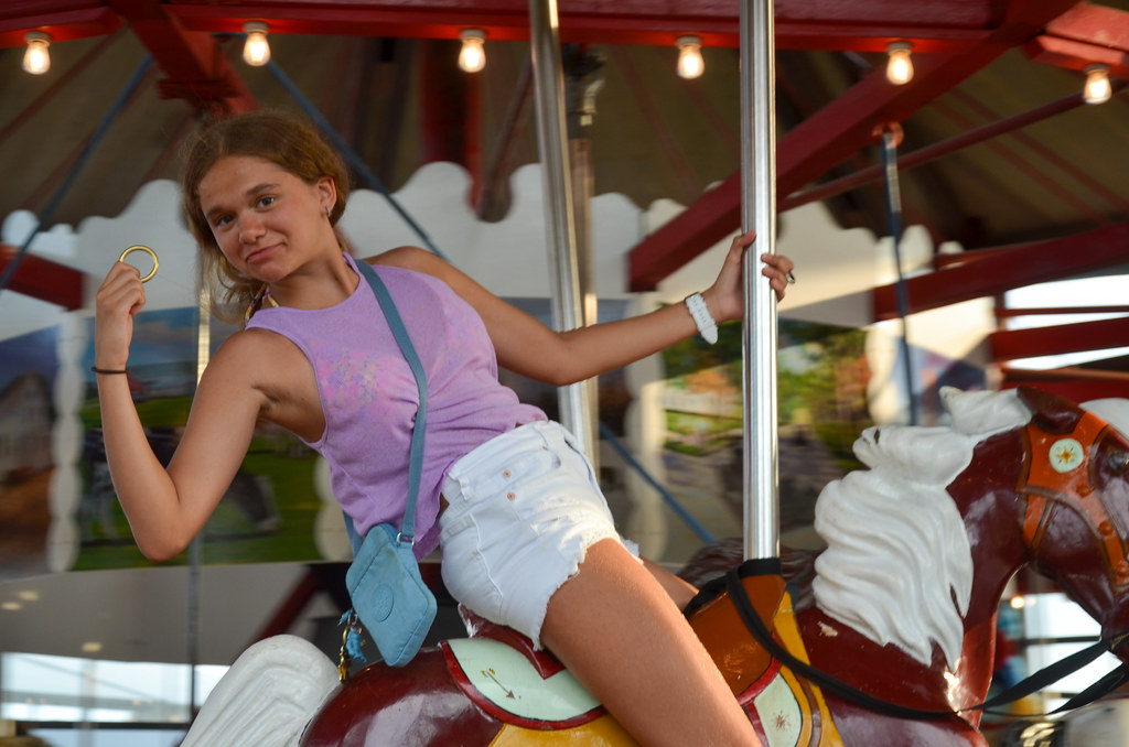 Violet And The Brass Ring Grabbing the brass ring at the G… Flickr
