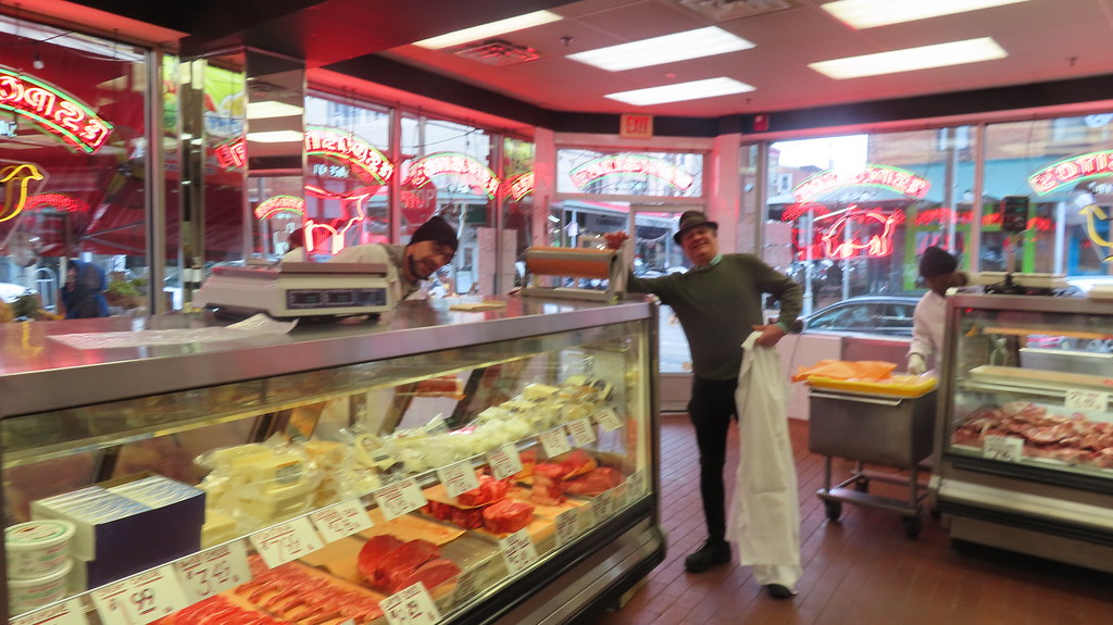 A strange sight no customers at Esposito's meat market." Flickr