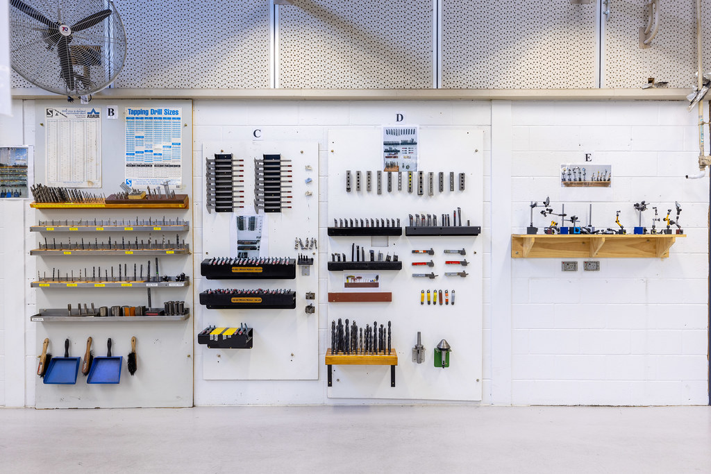 Drill bit rack Drill bits are stored in racks on a white w