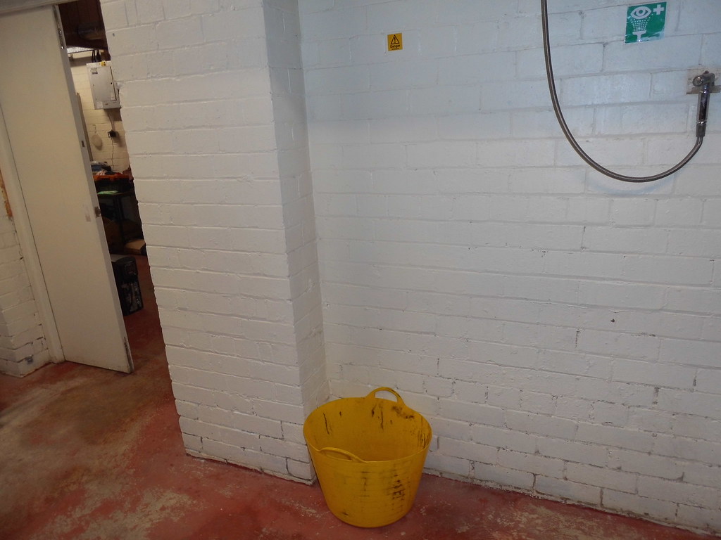 Encapsulated walls within warehouse shower room Complete Asbestos Surveys Flickr
