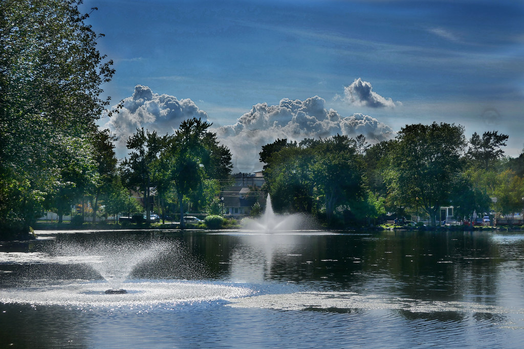 Mountain like Clouds behind Fountains Hecksher Park Norman Gates