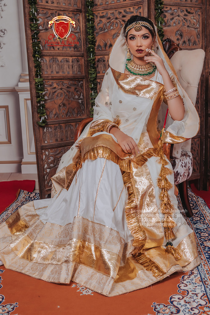 White rajputi poshak and golden laffa Banna and Baisa show… Flickr