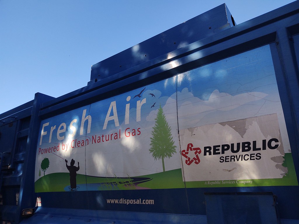 Art on ex Allied Waste Fresh Air 2432 Garbage trucks and city buses