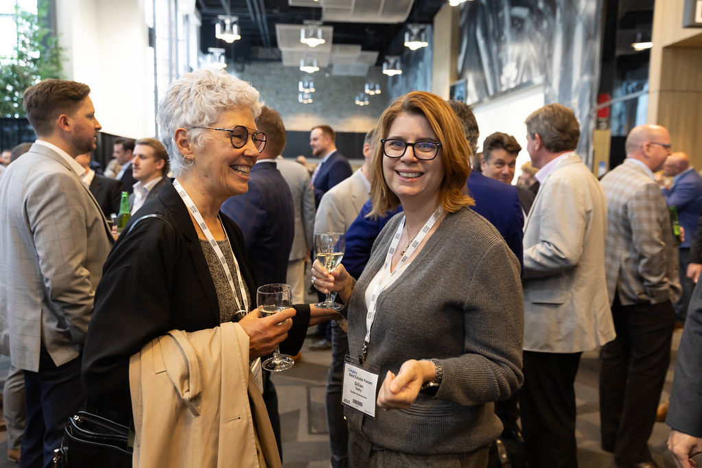 Visitors enjoying the networking reception Canadian Real Estate