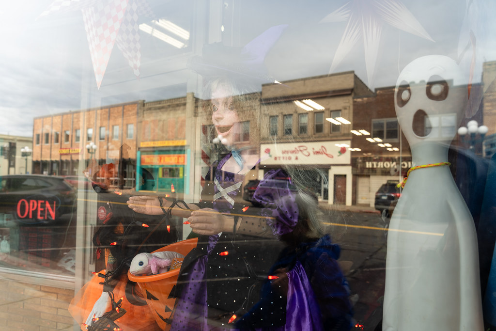 Halloween decorations and reflections of buildings on Chestnut street