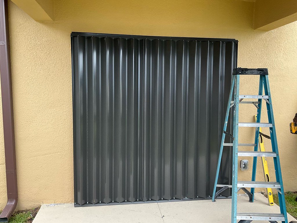 Accordion hurricane shutter installed. Another home protec… Flickr