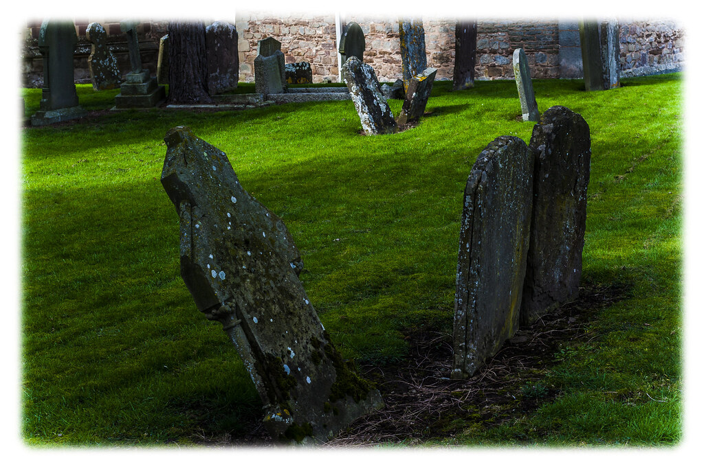 old stone Graves at Bosbury Church Mal Jones..... Guild of