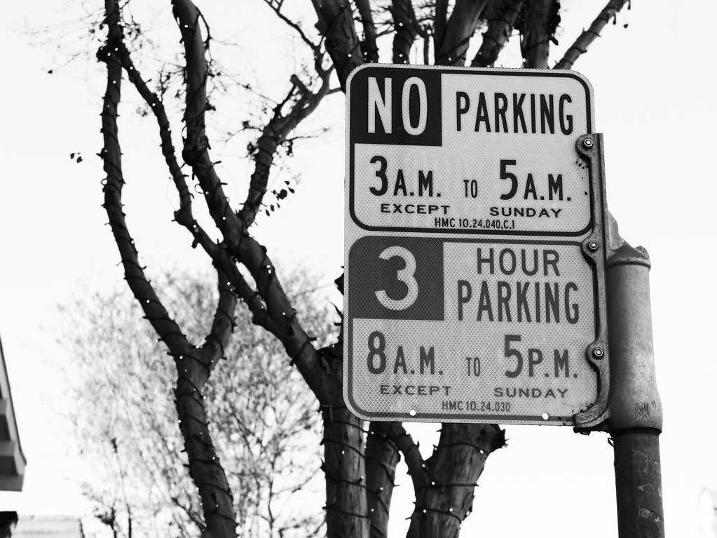 Parking Signs Monochrome capture of signs with an otherwis… Flickr