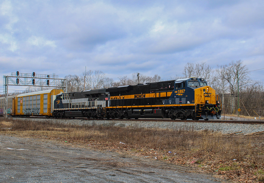 CSX M21629 flys through Hancock, WV with the heritage duo… Flickr