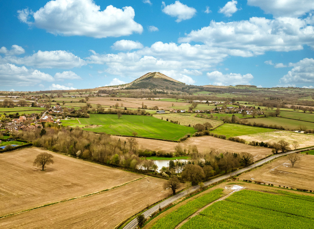 Sun shining on top the wrekin with Eaton Constantine villa… Flickr