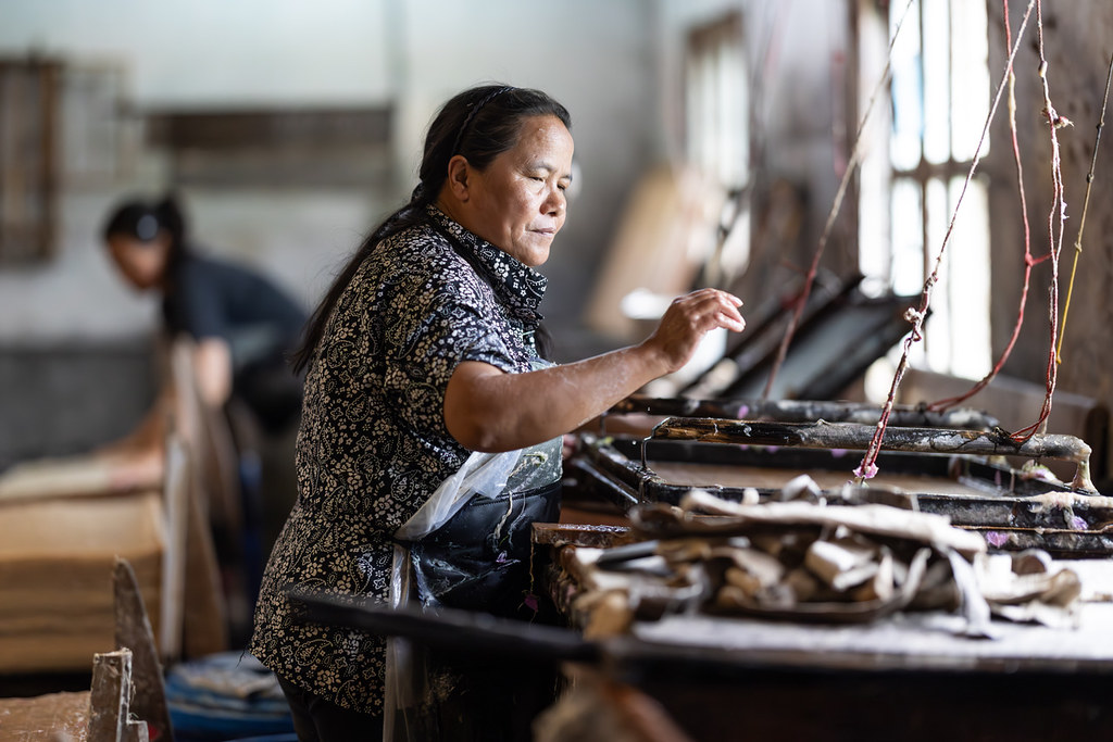 Bhutan At a small paper making factory in Bhutan. Benah Flickr