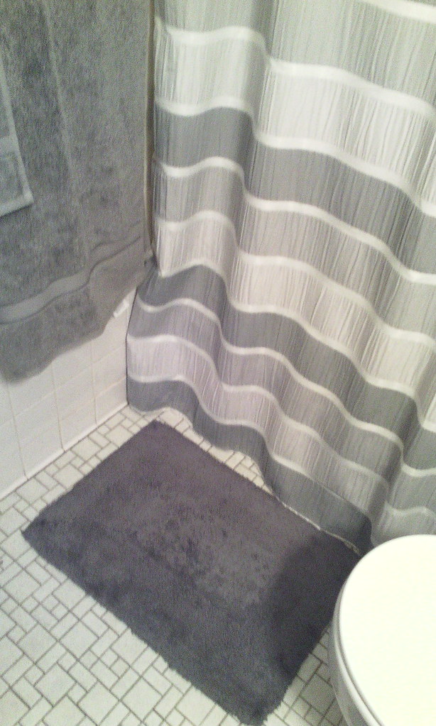 Grey new bathroom rugs and towels! They arrived last we… Flickr