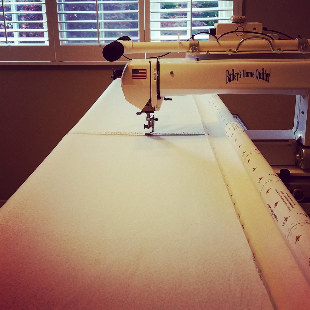 Loading a quilt backing on to my Longarm quilting frame Flickr