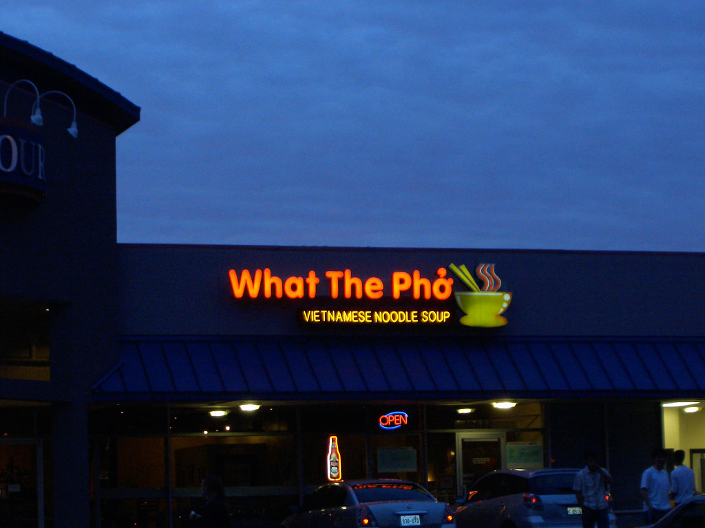 "What the Pho" neon sign in Bellevue I figured Shade would… Flickr