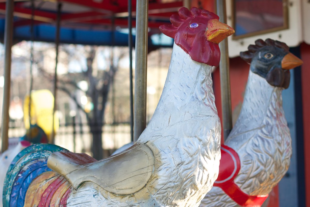 Kids Line Up to Ride the Merry Go Round Chickens? Alan Levine Flickr