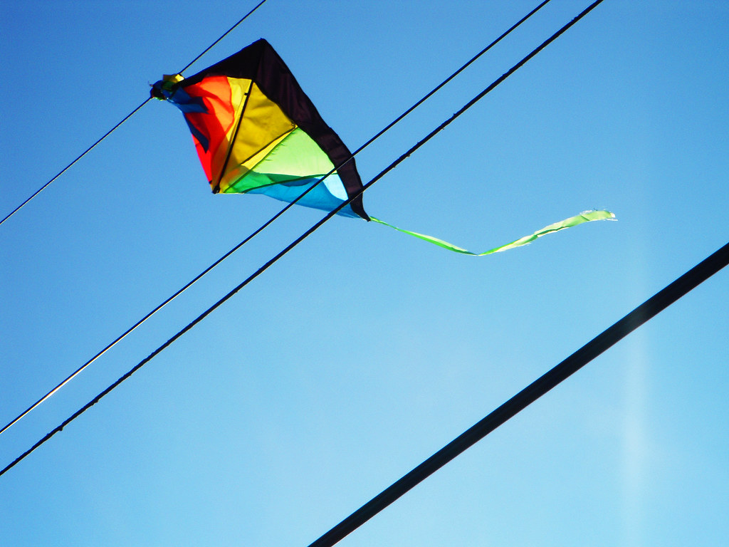 Let's go fly a kite Kite caught in some power lines on a c