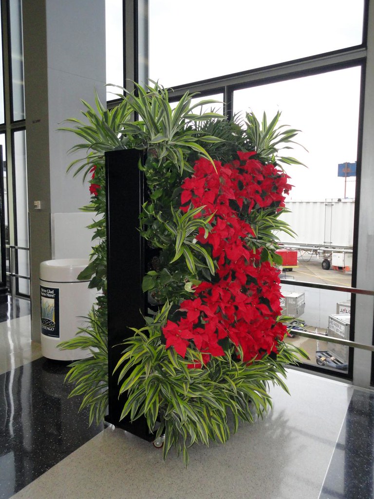 Uglyass plastic flower and plant arrangement at O'Hare Ai… Flickr