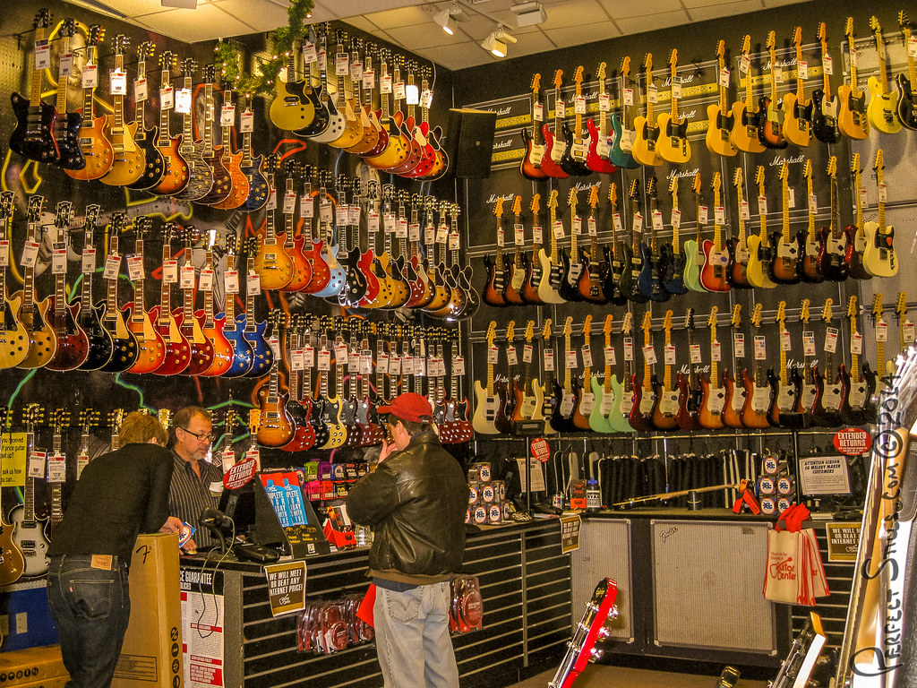 The Guitar Centre New York Just one small corner of the Gu… Flickr