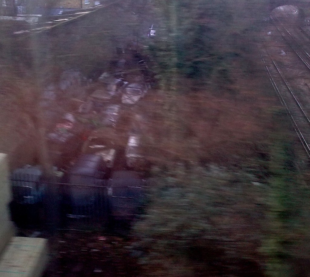 Putney Car Graveyard A dreadful quality image, taken with … Flickr