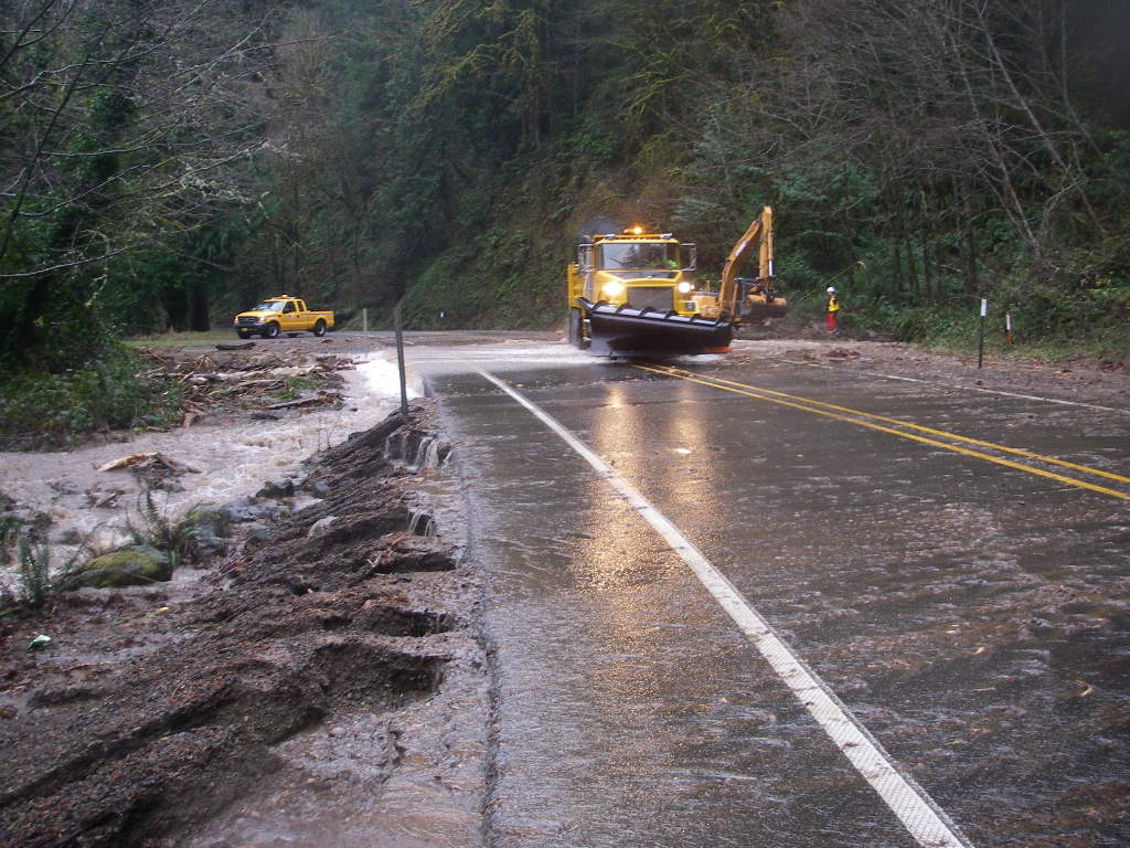 Clearing debris from clogged culvert ODOT crews work to cl… Flickr