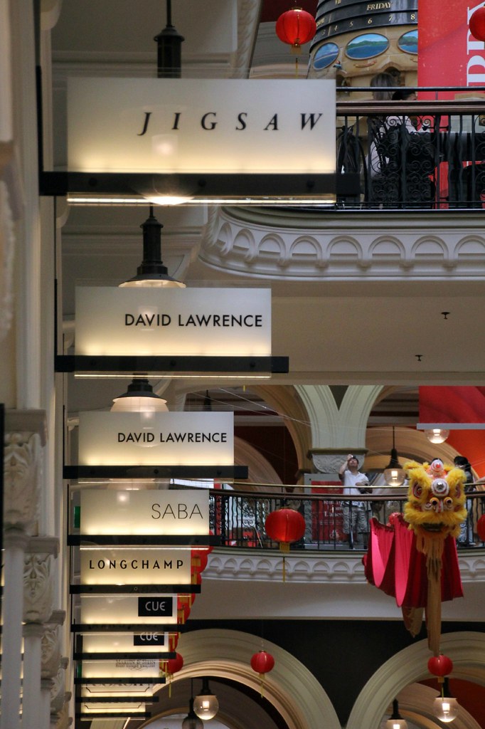 Shops signs in the QVB A line of shop signs in the Queen V… Flickr