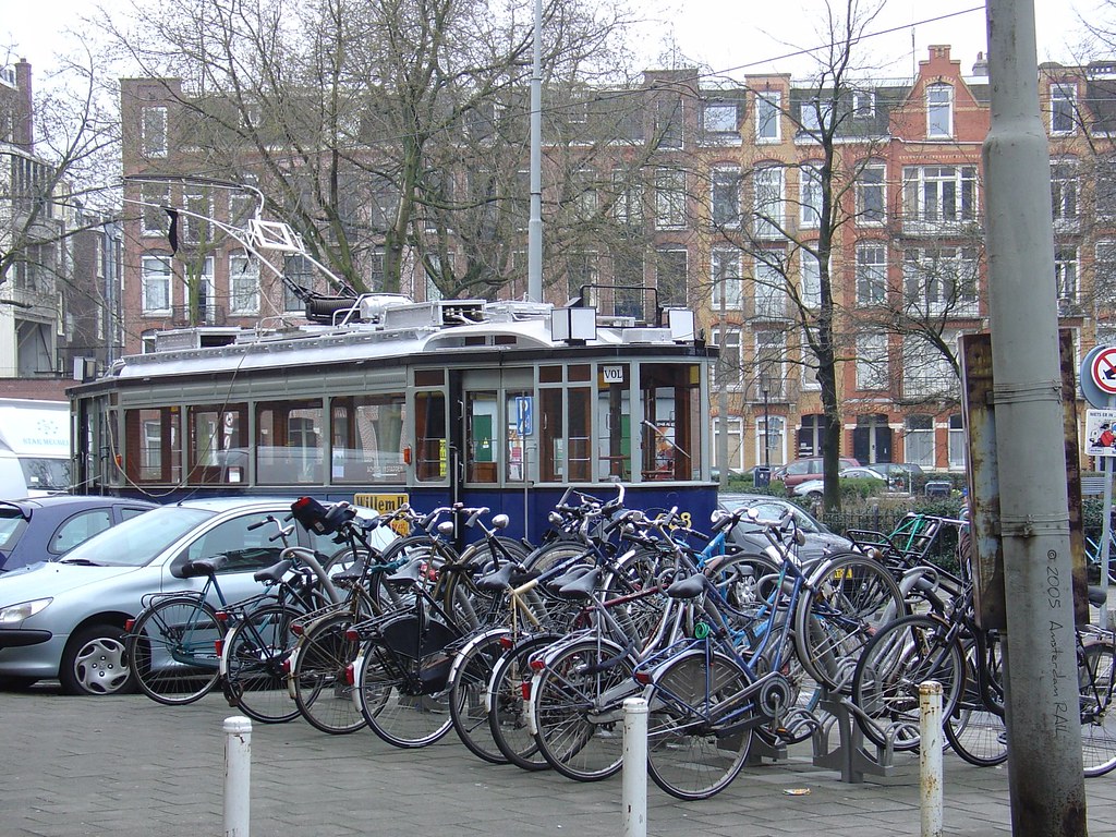 Amsterdam tram & bikes Often seen in the city trams and … Flickr