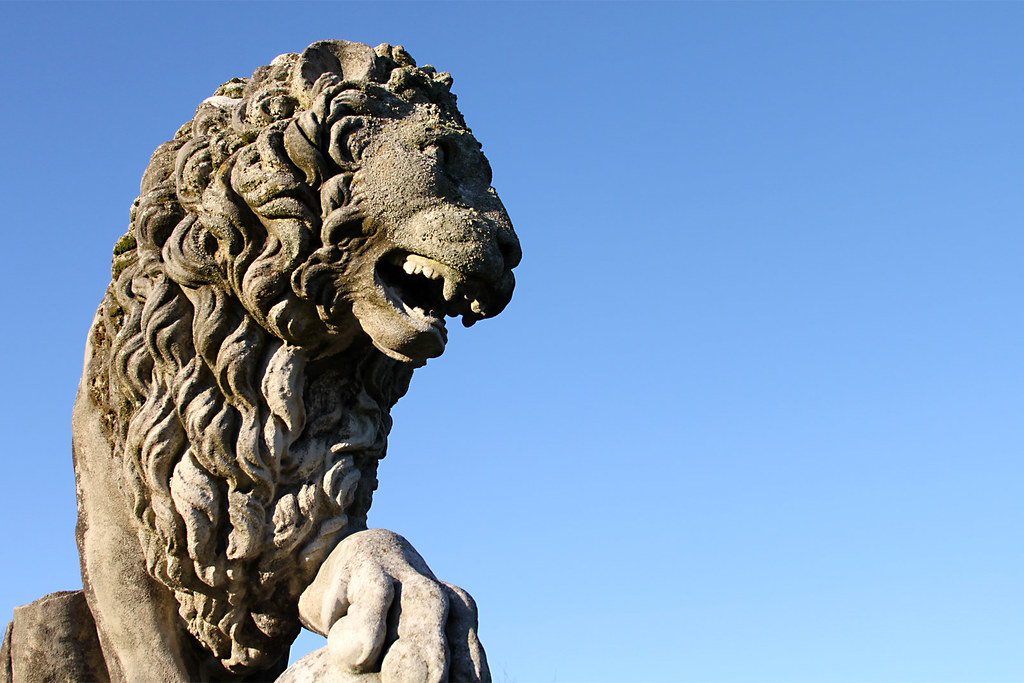 Lions of Stone Stone statue of a lion in the grounds of Ke… Flickr
