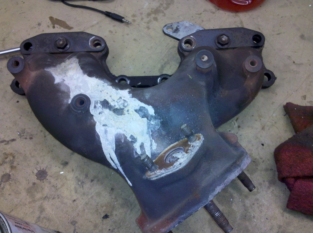 Cracked exhaust manifold. The packaging for JB Weld is acc… Flickr