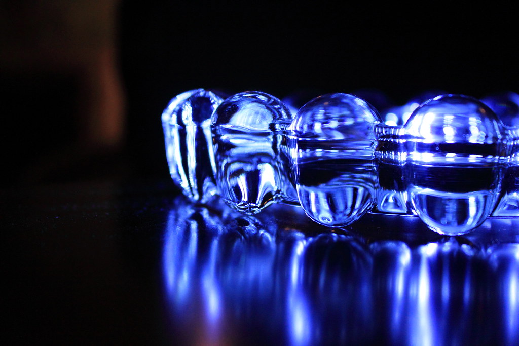 Blue Glow A glass ashtray illuminated by an led flashlight… Scott
