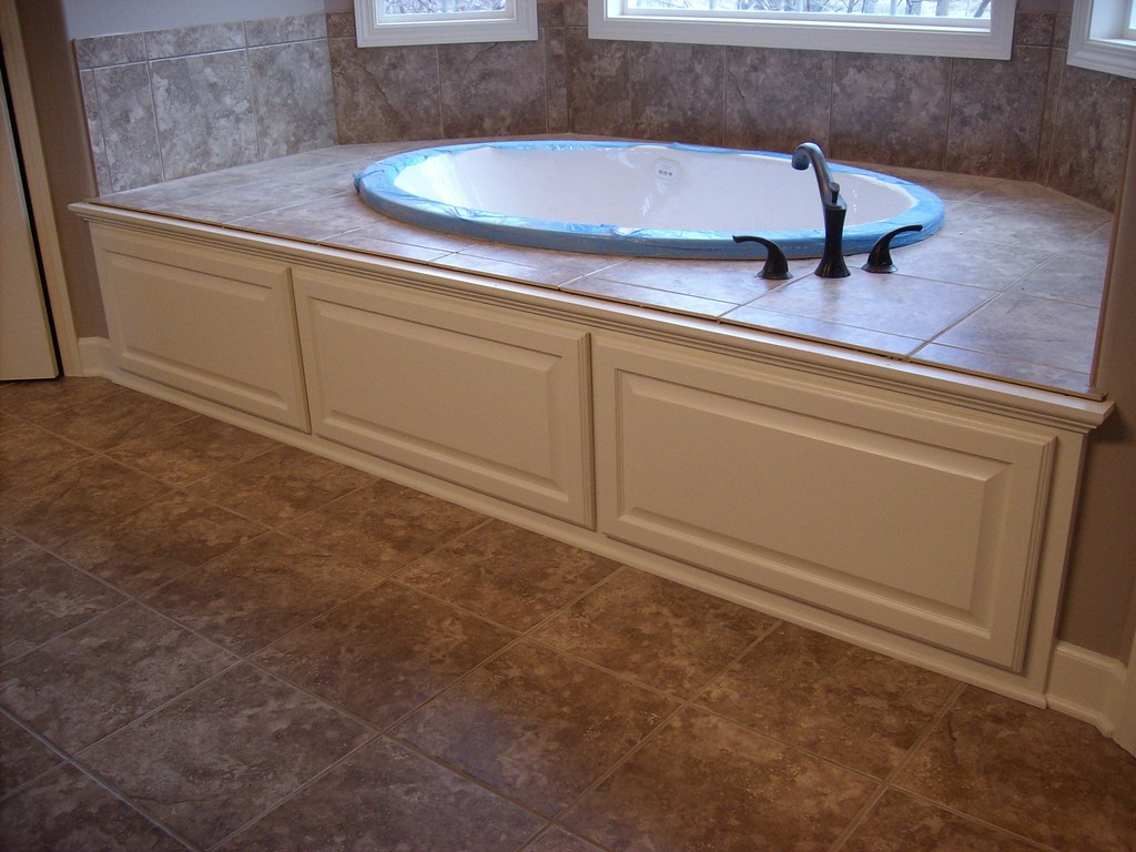 Tub Some bathtubs have wooden panels on the front, like th… Flickr