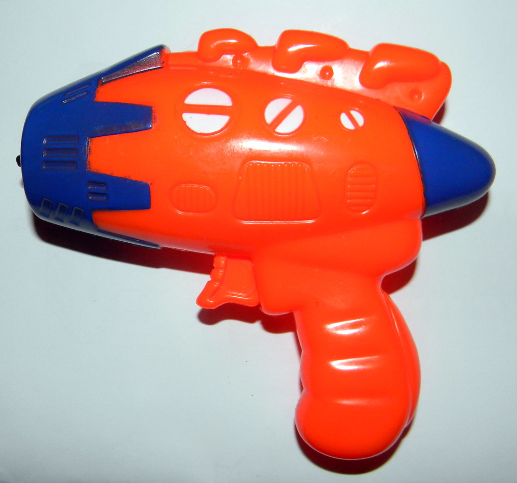 toy plastic ray gun orange 19th February 2012 2156.57pm Flickr