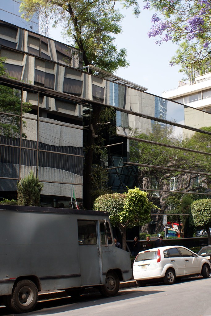 Zona Rosa Reflections 4 Surrounding buildings reflected in… Flickr
