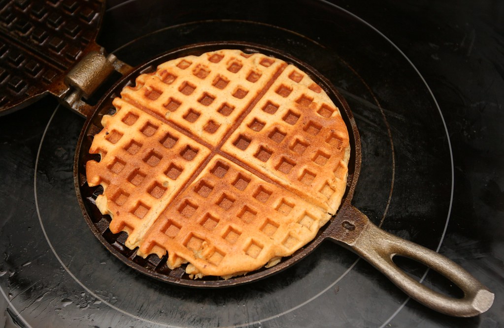 Using my cast iron waffle iron to make breakfast for our b… Flickr