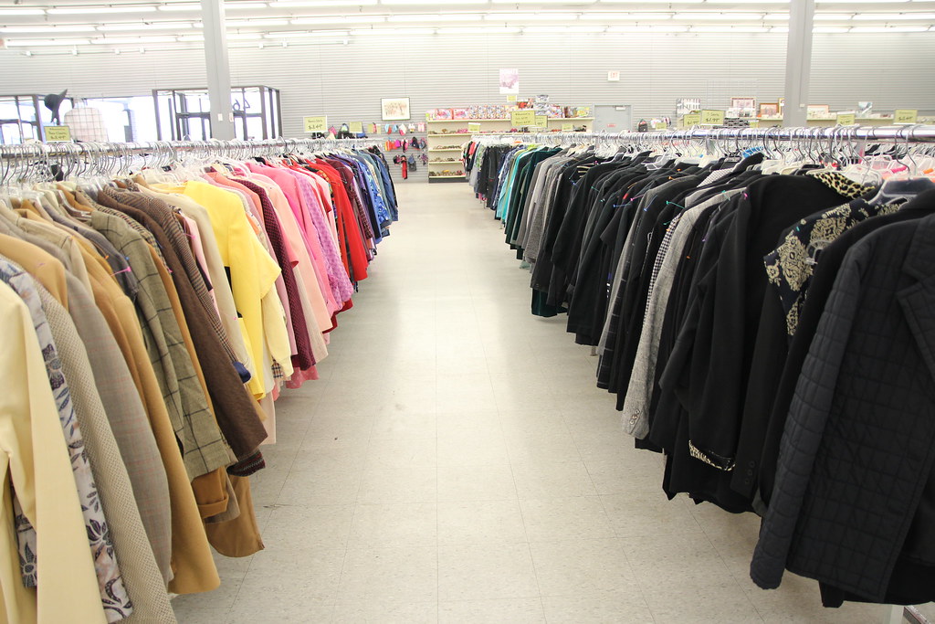 Blazers at Goodwill There are many rows of different style… Flickr