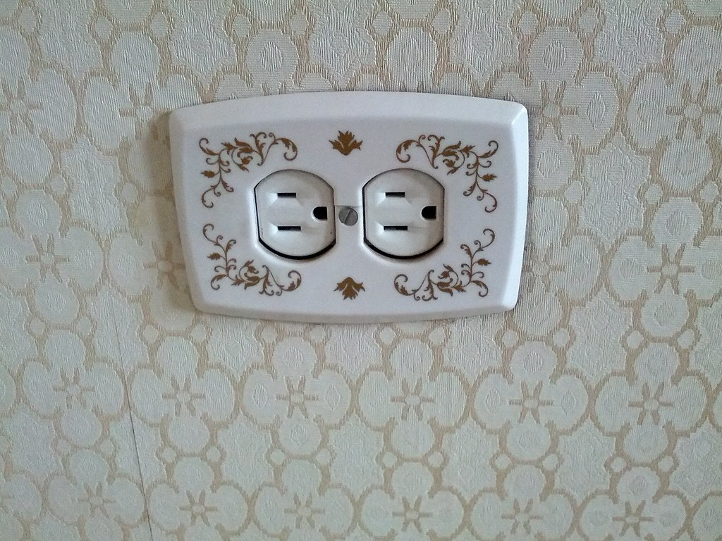 Pretty Electrical Outlet Cover and wallpaper. Hope they ke… Flickr