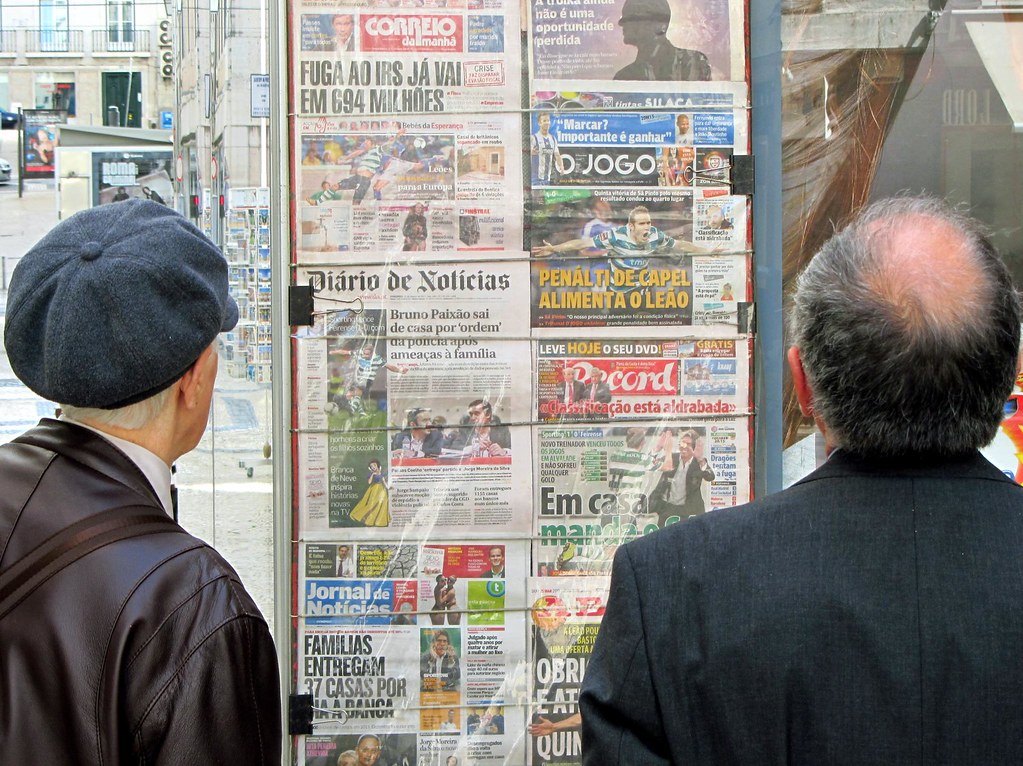 Reading the newspapers, Lisbon, Portugal Pranav Bhatt Flickr