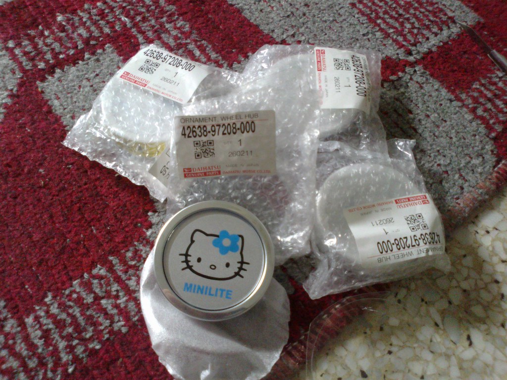 hello kitty gino minilite wheel caps original daihatsu Flickr